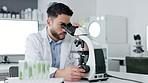 Happy, handsome and smiling scientist leading with innovation and modern science in a lab. Portrait of young proud biologist analyzing a medical sample with a microscope, cheerful while finding cure