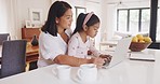 Happy, affectionate and smiling mother and daughter bonding, typing on laptop together at home. Loving parent and little girl enjoying online education programme. Lady teaching child to use keyboard