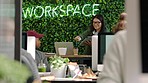 Digital, tech company and coworking business team pass a tablet with online client information. IT, technology and iot gen z staff group with b2b and web data in a futuristic startup working space
