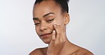 Beauty, makeup and face cosmetics for girl working on facial skincare with natural cream. Black woman using health, wellness and spa skin care product or cream to prevent wrinkles and maintain youth
