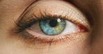 Closeup zoom of girl blue eye, moving to look around while thinking of a idea or memory. Macro of woman contact lens with green colour, with mind contemplating nostalgic memories