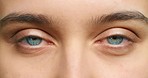 Blue eyes, eyesight and vision of beauty woman with dilated pupils from optometry test, drug or medication for wellness and healthcare. Portrait and macro or zoom of a human feeling awake and aware