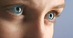 Blue eyes, eyesight and healthy vision of a woman for contact lenses and optometry awareness. Closeup zoom of a girl with a beautiful and natural iris color thinking or contemplating.
