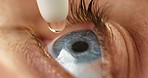 Eye drops, eye care and medicine in medical treatment. Tired eyes, irritation and allergies relief. Close up, zoom and macro shot of young woman applying eye drop for optical symptoms.