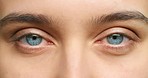 Vision, eyes and woman portrait watching in optometry healthcare, wellness or eyesight exam closeup, macro or zoom. Medical awareness and natural human blue iris for cosmetic beauty or contact lenses