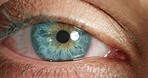 Blue eyes, dilating pupil or contact lens on a woman for vision improvement, optometry and human anatomy. Closeup, zoom or macro detail for awareness, eyesight and natural color iris of a person