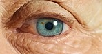 Moving eye, sight and vision of senior person eyeball. Health, medical eye exam and macro close up of blue eyes of a old person who is looking around and blinking while thinking or contemplating