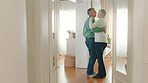 Mature couple dancing at home together for love, relax and intimate calm day. Retirement people, smile married partners and happy marriage with romantic slow dance, special bond and care relationship