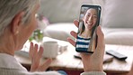 Video call, mother, and daughter wave and kiss on phone at college or university. Technology, communication and family on smartphone. Internet, wifi and happy woman calling mom in living room at home