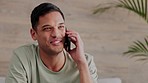 Phone, call and communication with a man talking, speaking and conversation on a mobile in his home. Cellphone, networking and connectivity with a young male having a discussion on a cellphone