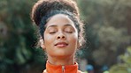 Meditation, happy and breathing with happy woman for peace, calm and quiet and spiritual wellness. Portrait breathe, fitness or yoga with young female and zen exercise practice in outdoor nature park