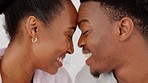Love, black couple, and trust with happiness together in cheesy relationship with playful partner. Happy man and woman in caring, loving and romantic commitment bonding with each other.