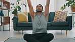 Meditation exercise, man yoga training and zen workout for spiritual health, relax for wellness and prayer hands for health in living room. Calm, healthy and Asian person praying for motivation