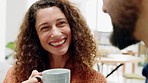 Happy couple, smile and coffee of a woman in happiness listening to husband speak in kitchen at home. Young people in a joyful, love and care relationship laughing with hot beverage in the morning