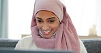 Video call communication from Islamic muslim girl with laptop talking, conversation or chat on global video conference. Happy, smile and Islam Pakistan woman with hijab talk about social media news
