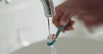 Healthcare and brushing teeth for dental or oral hygiene with a young woman in home bathroom. Female caring about the health of teeth and gums with a daily mouth and grooming cleaning routine
