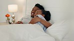 Black couple, tv remote and bedroom love with man and woman in bed to relax while watching television or streaming an online subscription. Young boyfriend and girlfriend laughing at a funny comedy 