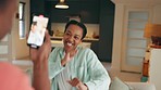 Dance, phone and couple dancing while live streaming and recording on social media app in an apartment. Influencer, content creator and happy black woman love filming trendy videos with man at home