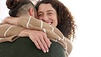 Couple hug, woman welcome man in home and smile after missing each other. Happy girl embrace romantic partner, in house or apartment, after time apart for work, study or travel  to foreign country