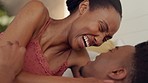 Happy, love and laughing of couple in a bed bedroom with a fun and quality time at home. Happiness and gratitude mindset of a girlfriend and boyfriend smile with energy, hug and kiss at a house
