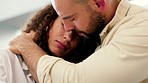 Crying, support and sad couple hugging while overcoming a anxiety problem, cheating or loss. Grief and mourning woman depressed while man show love and care after cancer, miscarriage or infertility
