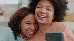 Smile, happy and phone selfie with friends on the sofa in the home living room. Lgbtq or lesbian couple laugh for funny social media post on the internet with 5g mobile smartphone with curly afro