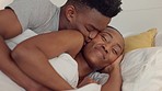 Love, kiss and couple wake up in the morning after relax, peace and calming sleep in hotel bedroom. Happy, smile and black woman and man on a romantic vacation to enjoy quality time and bond together