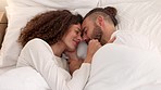 Couple bed, love sleeping and happy in the bedroom together in the morning, smile for marriage in house and sleep in home. Man and woman talking and giving hug with affection in apartment at night
