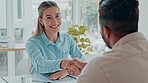 Woman handshake with man at table, happy for business meeting or job interview. Manager lady smile at desk give congratulations to male on getting contract,  partnership or promotion in his career