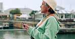 Travel, gps and search with old woman and phone on retirement on Berlin vacation following map, location and internet app. Network, technology and compass with elderly tourist on holiday journey