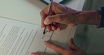 Contract, paper and hand with pen for signature on rental agreement, job or business partnership. Paperwork, writing and sign document for legal, law or corporate commitment on desk in office macro