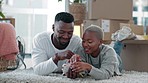 Couple, renovation and real estate with a black man and woman looking at a color pallet while redecorating their new home together. Property, homeowner and decisions with a male and female in a house