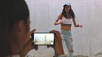 Women, phone and hip hop dance video for social media app, dancing audition or movement tutorial in New York city. Influencer and support friends with 5g mobile technology for street breakdance film