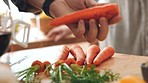 Hands, health or person in kitchen with carrot peeling, cooking dinner or brunch in home for vegetable meal, salad or food. Cook, vegan or wellness nutritionist or chef for diet, healthy or vitamin c