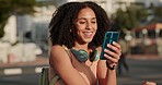 Selfie, black woman and phone being happy, communicate and smile while outdoor in the city with headphones. Lady, girl and smartphone for video call, relax and talking online being confident or proud