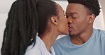 Love, black couple and kiss on bed in bedroom home with romance, intimacy and laugh. Trust, commitment and support of happy African man and woman, partners or lovers smile kissing together in house.