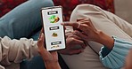 Couple, phone search and food app on the internet for lunch, online shopping for fast food on tech and on grocery store website for dinner. Hands on mobile for groceries and choice on web supermarket