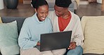 Black couple, laptop and home sharing kiss and laughing at comedy movie, streaming online and watching funny video on sofa in living room. African man and woman with internet subscription and wifi