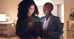 Black woman, employees working in office at night and discuss a corporate plan with digital tablet . Company marketing team, talking business strategy and collaborating for professional brand success