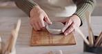 Clay bowl, woman hands and sculpture in artist studio, workshop and small business of creative product, craft and pottery. Ceramic designer, artisan and creation class, mold form and handmade process