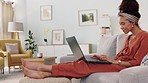 Relax, laptop and search with woman in living room typing for networking, streaming or social media news. Internet, technology and home with freelancer working on email, online shopping or website