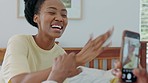 Phone, photograph and love with a black couple bonding and being playful in the bedroom of their home. Mobile, picture and joking with a young man and woman taking a photo on a smartphone together