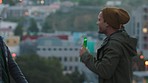 Beer, diversity and friends dancing on terrace and drinking enjoying freedom and holiday vacation in Amsterdam city. Happy young men drinking alcohol together to dance music on roof top or balcony