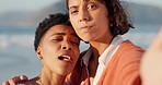 Lesbian, selfie and lgbt couple at the beach making silly faces for picture. Dating, love and young lesbian couple enjoying summer holiday by the sea having fun, smile and funny expressions together