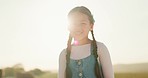 Happy, little girl and smile for agriculture, countryside or travel in summer vacation enjoying time in the sun outdoors. Portrait of child smiling in happiness for getaway, trip or holiday in nature