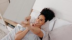 Woman, digital tablet or selfie in bedroom for social media, profile picture or dating app communication. Smile, happy or technology photography for comic person lying in house, home or holiday hotel