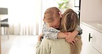 Hug, mother and child with love, care and smile to celebrate mothers day in their house. Young girl hugging her mom for affection, happiness and peace in the living room of their family home