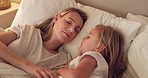Bed, mom and child relax sleep together in bed, calm and peace in bedroom at night in home. Tired young mother, kid girl sleeping and childhood support, trust and care in safe peaceful family house