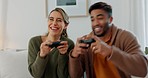 Video game, fun and excited diversity couple with crazy high energy, play together and enjoy quality bonding time at home. Entertainment technology, controller and competition for happy woman and man