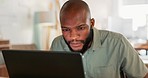 Laptop, work and businessman reading an email, working on the internet and doing a search for ideas at work. African worker, employee or man in corporate on the web with technology for a project